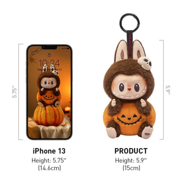 Close-up detail shot of the vinyl face and pumpkin on the Labubu Sitting Pumpkin pendant.
